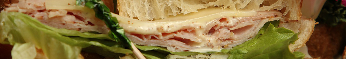 Eating Deli Sandwich at Pearson Deli restaurant in San Diego, CA.